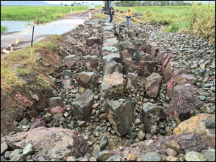 Completed nature-like fish ladder constructed by CS Environmental and showing large ridge and wall rocks which are used to create deep pools to dissipate flow turbulence in fishway pools.