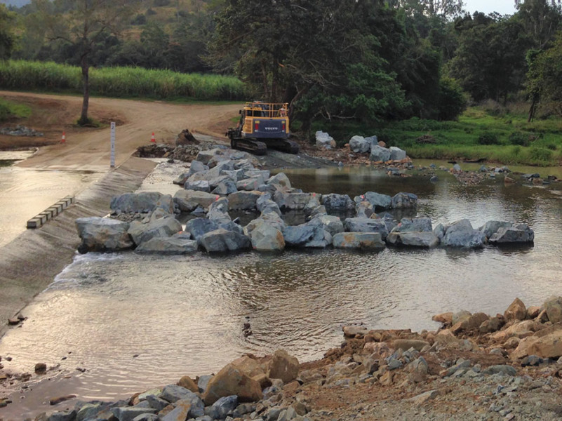 Side-view showing fishway walls nearing completion.